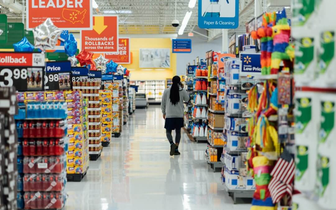 Man walks through empty supermarket
